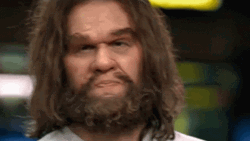 Caveman Pose For Selfie In The City GIF