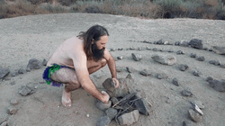 Caveman Trying To Make Fire GIF
