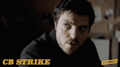CB Strike Text Above Man's Face GIF