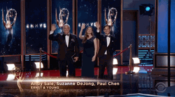 Celebrities Smile And Wave During The Emmy Awards GIF