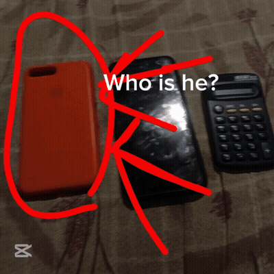 Cell Phone And Calculator With Who Is He GIF