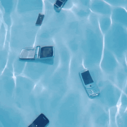 Cellphone Drowning In The Pool GIF
