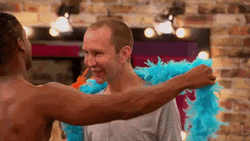 Chad Michaels Wearing Feathers GIF