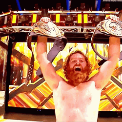 Champ Is Here Sami Zayn Showing Two Belts GIF