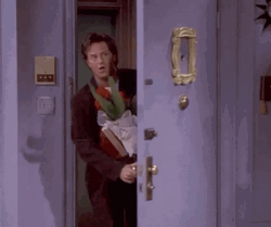 Chandler Bing Bringing Flowers Happy Valentine's Day GIF