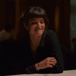 Charlbi Dean Chuckle GIF