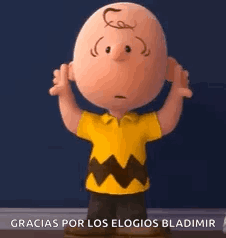 Charlie Brown From The Peanuts Movie Is Standing In A Room With His Arms In The Air . GIF
