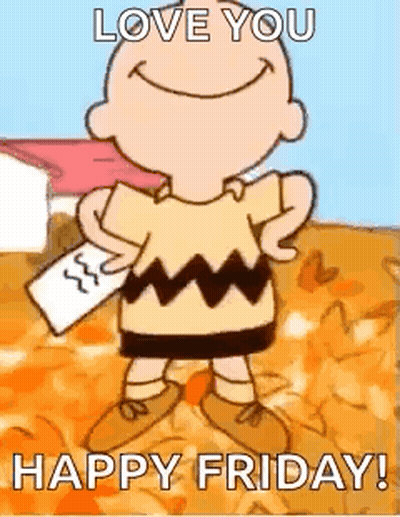 Charlie Brown Holding Paper In Leaves GIF