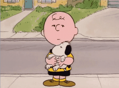 Charlie Brown Holding Snoopy GIF