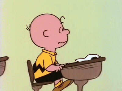 Charlie Brown In Classroom With Hands Together GIF