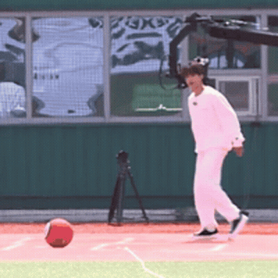 Charlie Brown Walking On Grassy Field GIF