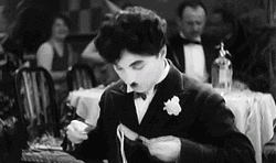 Charlie Chaplin Eating Pasta GIF
