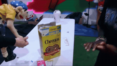 Cheerios Box Next To Puppet GIF