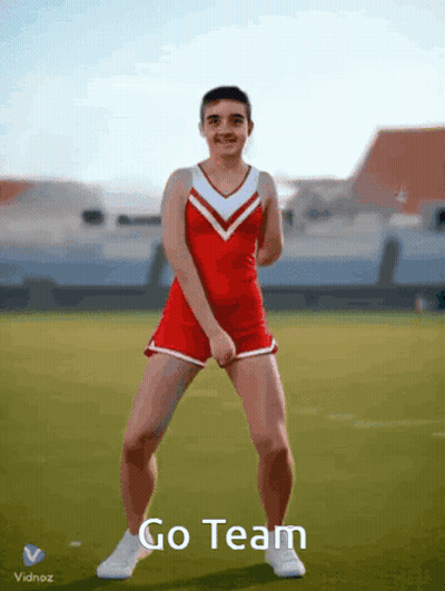 Cheerleader Dancing On Field Saying Go Team GIF