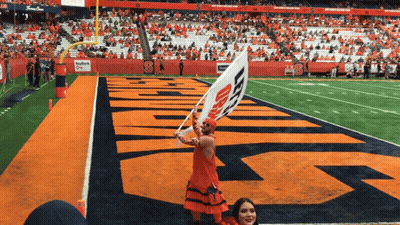 Cheerleader Holding Flag S GIF
