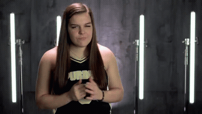 Cheerleader In Purdue Uniform Making Face GIF
