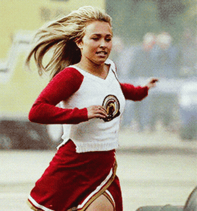 Cheerleader In Red Skirt And White Top With Rainbow GIF