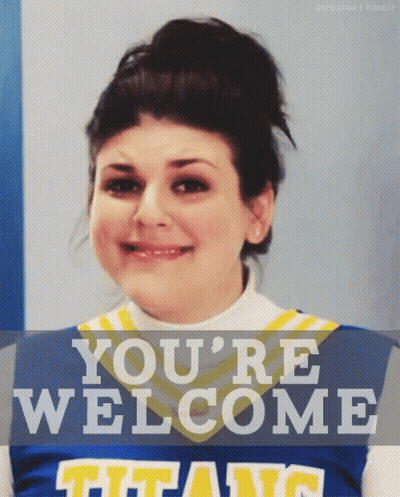 Cheerleader In Titans Uniform Smiling GIF