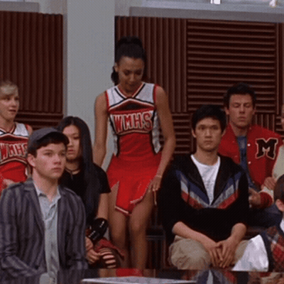 Cheerleader In WMHS Uniform In Crowd GIF