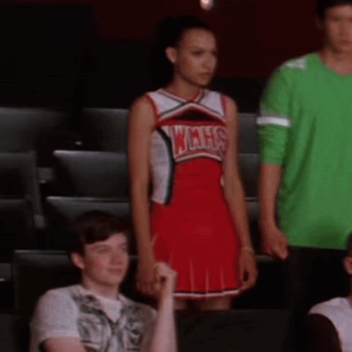 Cheerleader In WMHS Uniform In Stadium GIF