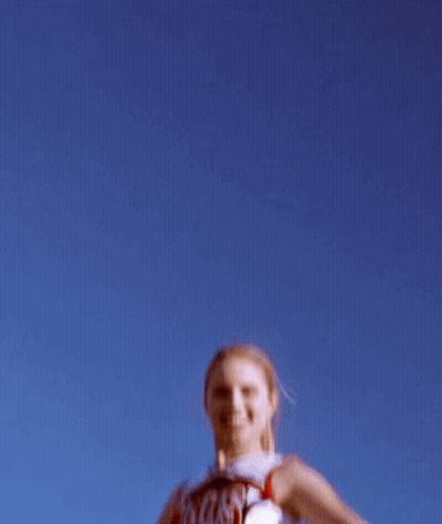 Cheerleader Jumping In Uniform Saying WHS GIF