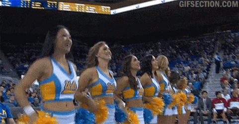 Cheerleader Shaking Off Pompoms GIF