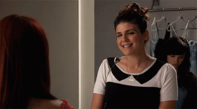 Cheerleader Smiling In Titans Jersey GIF