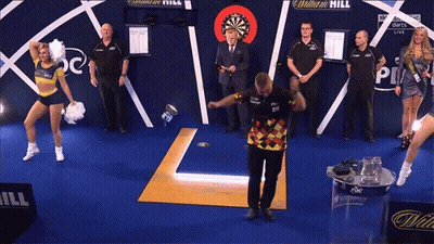 Cheerleader Throwing Trophy At Dart Board Saying William Hill GIF
