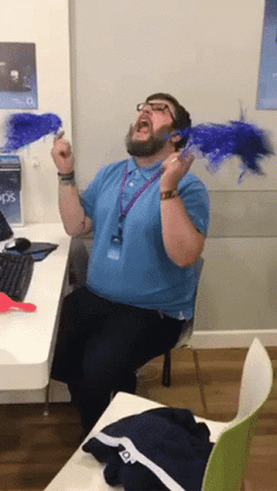 Cheerleader Tired Employee Waving Pompoms GIF