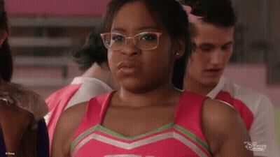 Cheerleader With Glasses And Pink Top GIF