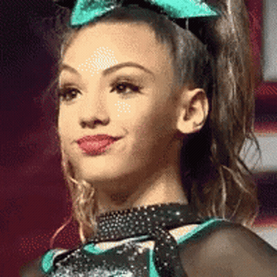 Cheerleader With Green Bow And Black Choker GIF