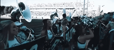 Cheerleaders And Marching Band With Nevada Banner GIF