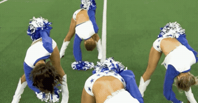 Cheerleaders Doing Handstand On Field GIF