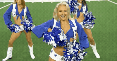 Cheerleaders In Blue And White Star Uniforms On Field GIF