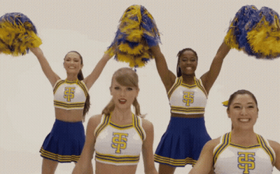 Cheerleaders In Blue And White Uniforms With Letter H GIF