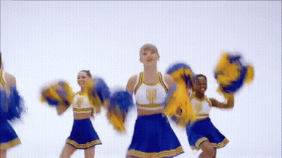 Cheerleaders In Blue And Yellow Holding Pom Poms GIF