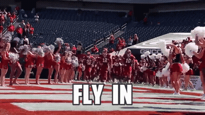 Cheerleaders Leading Football Team GIF