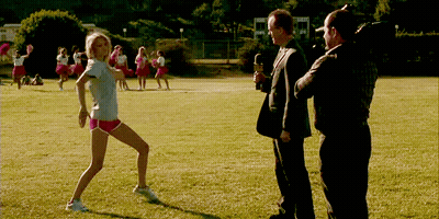 Cheerleaders On Field With Reporter GIF