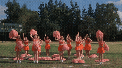 Cheerleaders Performing In Front Of Guest Scoreboard GIF