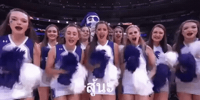 Cheerleaders Standing On Basketball Court With Mascot GIF