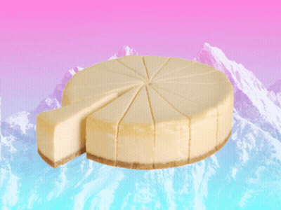 Cheesecake With Slice Taken Out On Mountain Background GIF