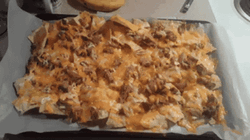 Cheesy Delicious Pork Nacho GIF