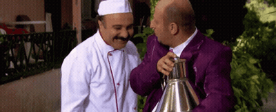 Chef And Man In Purple Suit Talking GIF