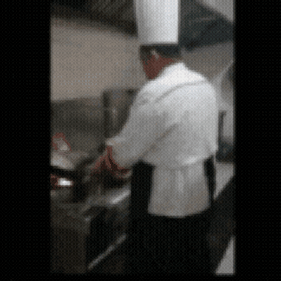 Chef Cooking In White Hat And Apron GIF