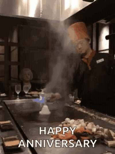 Chef Cooking On Grill Saying Happy Anniversary GIF