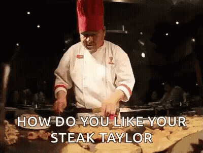 Chef Cooking Steaks On Grill Saying How Do You Like Your Steak Taylor GIF
