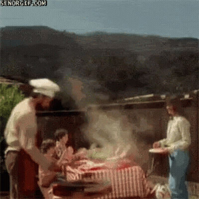 Chef Hat Man At Picnic Table With Food GIF