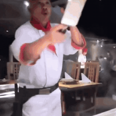 Chef Holding Large Knife GIF