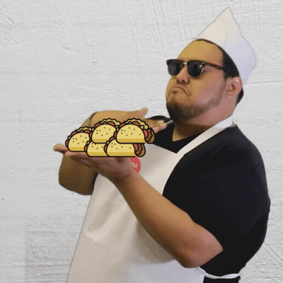 Chef Holding Stack Of Tacos GIF