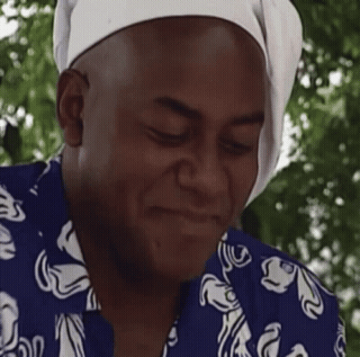 Chef In Blue Shirt Smiling Eyes Closed GIF